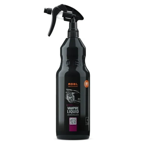 A bottle of ADBL Vampire Liquid Iron Remover being sprayed on a rim